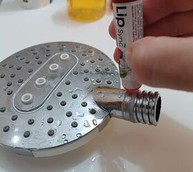 She smears Chapstick around her shower head for a trick that actually works!