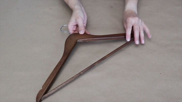 Disassemble wooden hangers for our DIY lap desk project