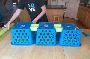 This mom sticks pieces of pool noodles between dollar store baskets for this genius idea