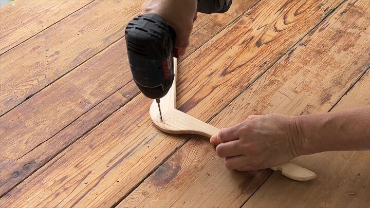 Drilling a pilot hole into the hanger