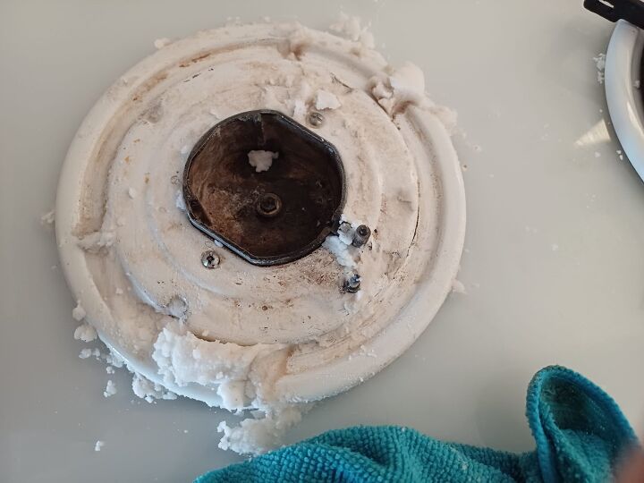 Spread the paste evenly over the stovetop surface for thorough cleaning