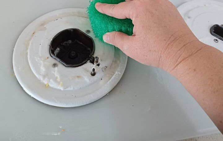 Scrubbing with the paste helps restore shine to your stovetop burners