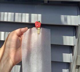 She hangs dryer sheets on her doors and windows for this handy summer hack