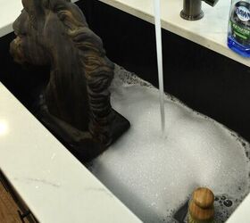 She puts a concrete statue in her sink for this gorgeous idea