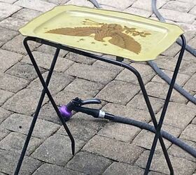 Instead of tossing this old tv tray, she gave it a fun (and nostalgic!) makeover