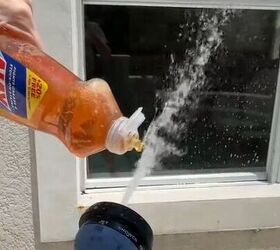 She sprays her hose through dish soap for this 2-minute summer hack