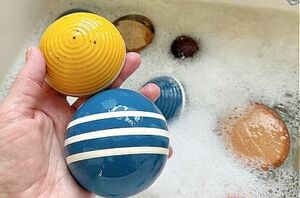 She bathes a bunch of croquet balls for this cute decor idea