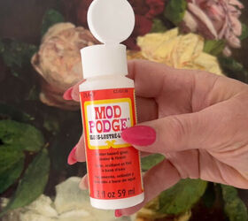 Watch how she uses Mod Podge to make her cheap prints look like canvas art