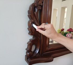 Effortlessly remove dust from picture frame grooves with this tampon cleaning hack