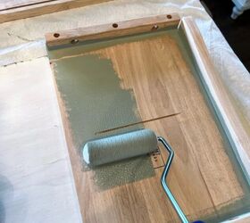 She paints a basic bookcase this color for this thoughtful gift for her new grandson