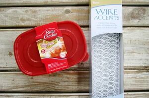 Wrap plastic containers in chicken wire for this stunning fall trick
