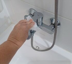 Effortlessly remove soap scum with a damp dryer sheet!