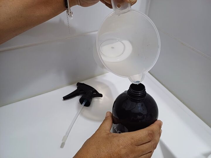 Mixing the perfect DIY daily shower cleaner spray to keep your bathroom spotless