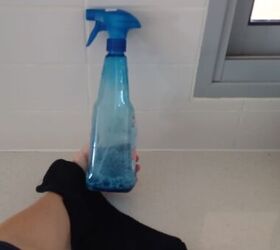 Create a homemade daily shower spray that prevents water spots