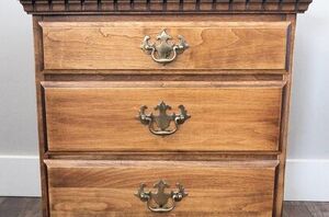 She cuts the bottom off a nightstand for the most beautiful bedroom upgrade
