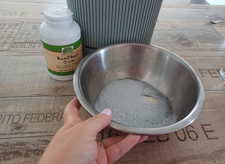 Even the toughest grime can't stand up to this homemade shower cleaner!