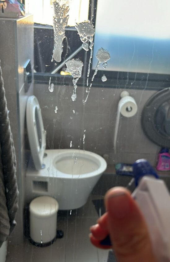 Applying the cleaner—watch as it breaks down tough grime and hard water stains!