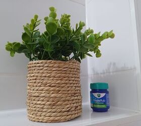 Create a DIY bathroom air freshener by placing an open jar of Vicks VapoRub in a corner