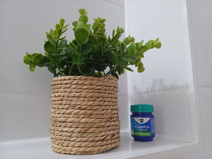 Create a DIY bathroom air freshener by placing an open jar of Vicks VapoRub in a corner