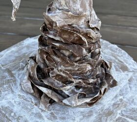 This papier-mache idea is such a clever way to serve your Halloween candy this year