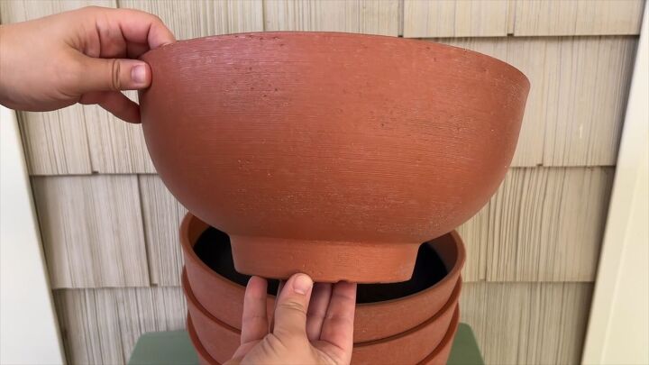 Gather your planters—these will serve as the sphere legs