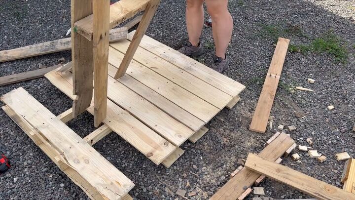 Removing boards from the third pallet with a crowbar