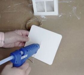 Use hot glue to attach your homemade handle