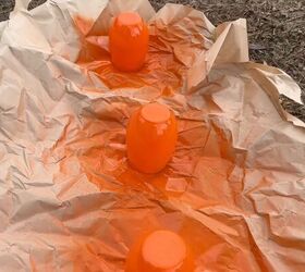 Glasses drying with orange paint applied