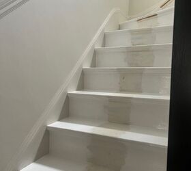 Watch how some paint and tape upgraded this boring staircase