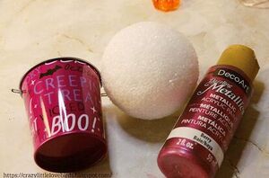 Glue a ball to a bucket for this beautiful fall idea
