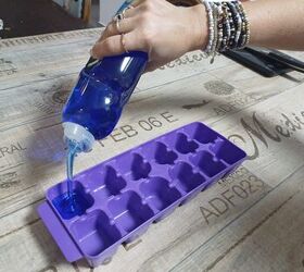 She puts an ice cube tray filled with dish soap in the freezer for a clever trick