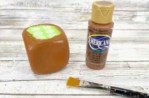 She paints a giant dollar store die for this super sweet fall idea