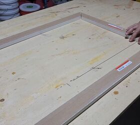 Dry fit the trim around your TV before applying wood glue to secure the pieces