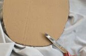 Cut a circle of cardboard for this pretty organizing idea