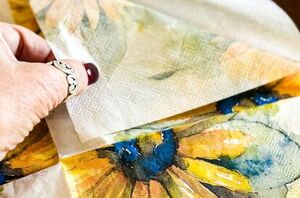 Pull apart a few adorable paper napkins for this stunning idea