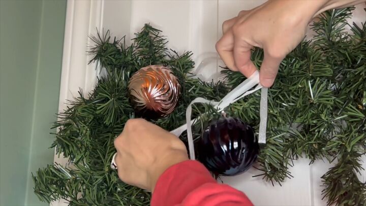 Adding decorative ribbons brings texture to your DIY Christmas garland