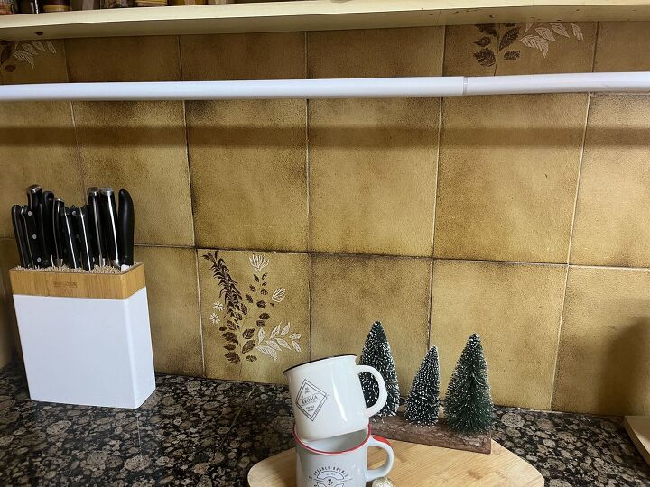 Tension rod installed for the holiday garland