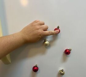 She taped tiny ornaments on her fridge for the cutest holiday surprise