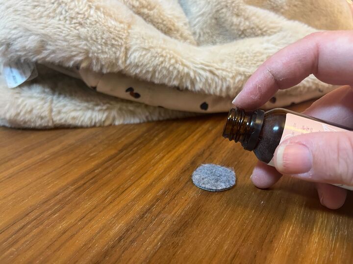 Choose cat-safe, potent-smelling oils to keep your tree trouble-free