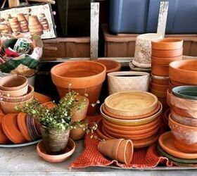 She grabs all of her terracotta flower pots for this ridiculously cute idea