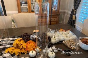 Stuff fairy lights into a glass vase for the simplest and prettiest table accent