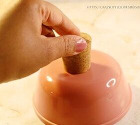 Glue a cork to a bowl for this sweet decor idea