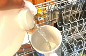Put a cup of vinegar in your dishwasher for this clever, quick trick