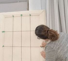 She draws lines on an old door for this beautiful organizing hack