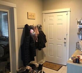 You're going to love the way she made this chaotic entryway much more organized and welcoming