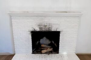 Here's how to totally refresh an old, sooty fireplace