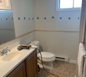 This gorgeous bathroom transformation took less than $200 total to do!