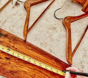 She uses a stack of wooden hangers for this gorgeous storage idea