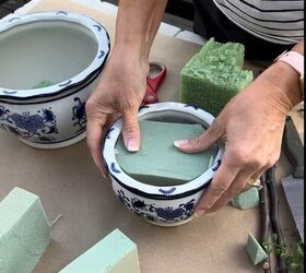 She presses foam into a pot for this gorgeous spring decor idea