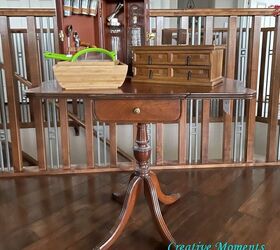 With just a bit of paint, she added so much more personality to this vintage drop leaf table